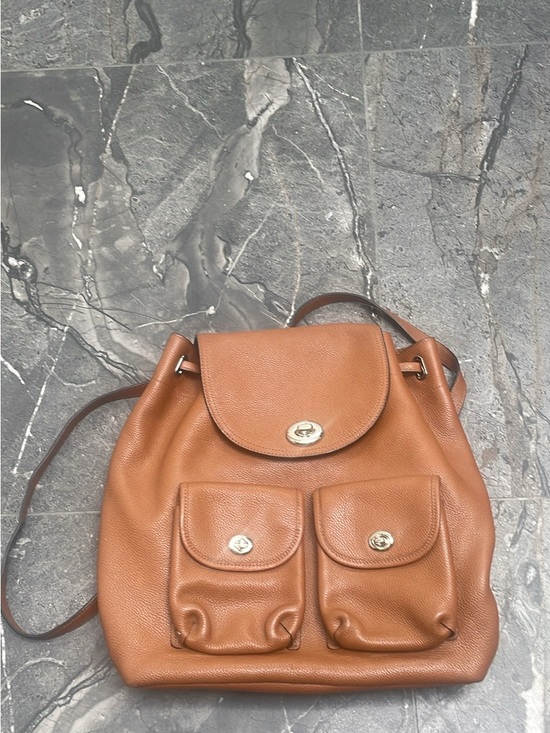 Coach Handbags - Coach Pebbled Leather Drawstring Backpack in Cognac